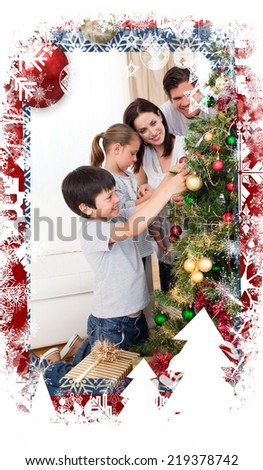 Happy family decorating a Christmas tree with boubles against christmas themed frame