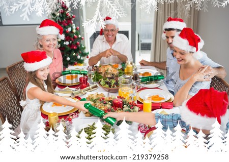 Cheerful family at dining table for christmas dinner against fir tree forest and snowflakes