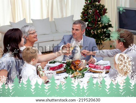 Family tusting in a Christmas dinner with champagne against snowflakes and fir trees in green