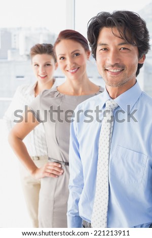 Business team standing all together at work