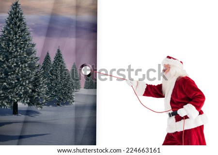 Santa pulls something with a rope against white curtain blind