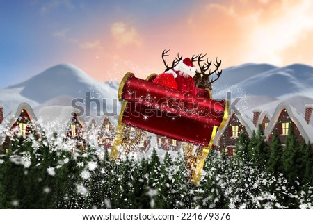 Santa flying his sleigh against digitally generated snowy land scape