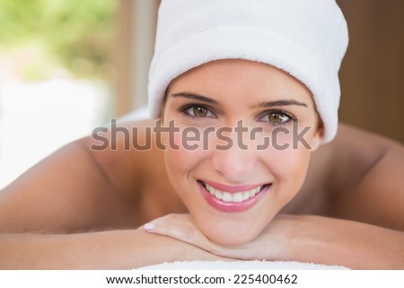 Close up portrait of a beautiful young woman with towel wrapped on head