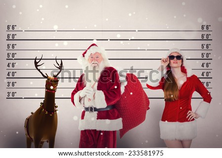 Santa carries his red bag against mug shot background