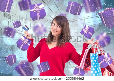 Brunette holding gift and credit card against light glowing dots design pattern