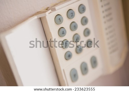 Close up of home security keypad on the wall