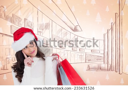 Festive brunette holding shopping bags and thinking against orange tree pattern