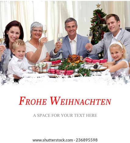 Family tusting in a Christmas dinner with white wine against christmas greeting in german