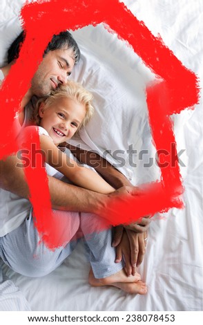 Father and daughter relaxing on bed against house outline in clouds