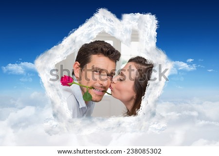 Side view of a loving woman kissing man against bright blue sky over clouds