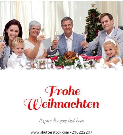 Family tusting in a Christmas dinner with white wine against christmas greeting in german