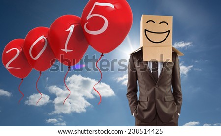 Anonymous businessman with hands in pockets against cloudy sky with sunshine