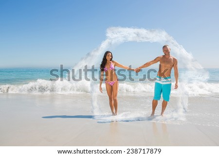 Smiling handsome man holding his girlfriends hand against house outline in clouds