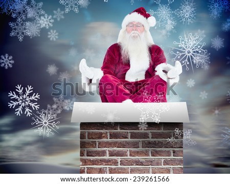 Santa Claus sits and meditates against snowy landscape with fir trees