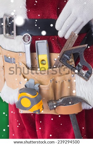 Father Christmas is wearing a tool belt against green snowflake background