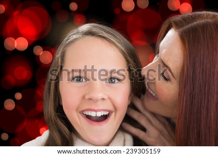 Mother and daughter telling secrets against red glowing dots on black
