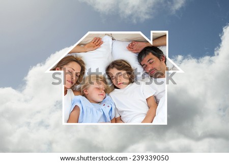 Loving family sleeping together against bright blue sky with clouds