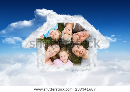 House outline in clouds against bright blue sky with clouds
