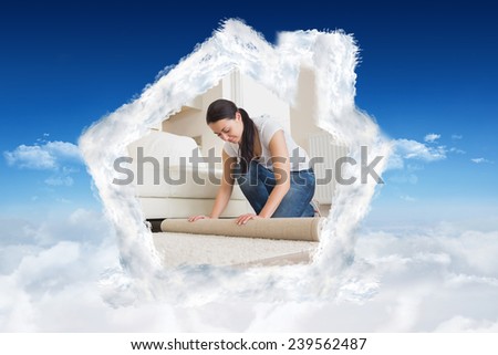 Two people moving into their house against bright blue sky over clouds