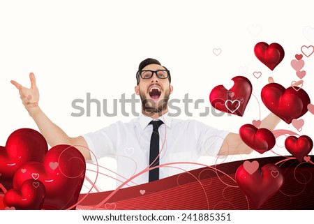 Geeky young businessman with arms out against valentines heart design