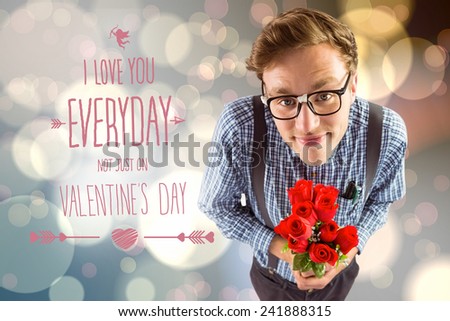Geeky hipster holding a bunch of roses against light glowing dots design pattern