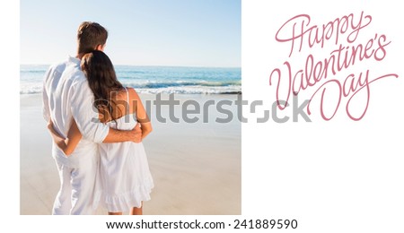 Content couple looking at the waves against cute valentines message