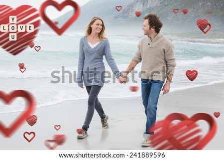Couple holding hands and walking at beach against love you tiles