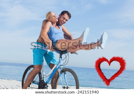Happy man giving girlfriend a lift on his crossbar against red smoke heart