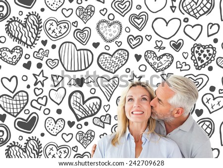 Affectionate man kissing his wife on the cheek against heart pattern