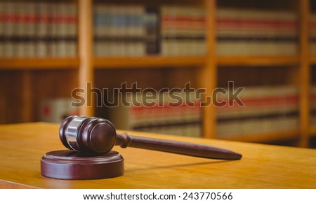 Gavel resting on sound block in library