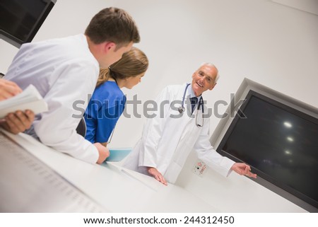 Medical professor teaching young students at the university