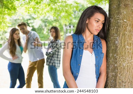 Lonely student being bullied by her peers at the university