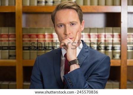 Lawyer frowning in the law library at the university
