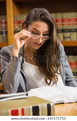 Pretty lawyer in the law library at the university
