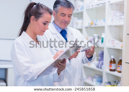 Pharmacist looking a medication for a prescription in the pharmacy