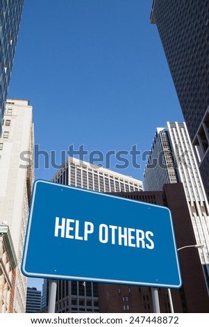 The word help others and blue billboard against new york