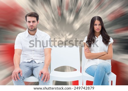 Angry couple not talking after argument against love heart pattern