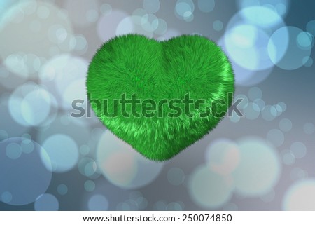 Green heart against light glowing dots design pattern