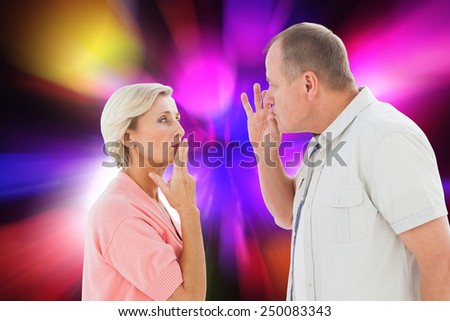 Older couple holding hands to mouth for silence against digitally generated cool nightlife design
