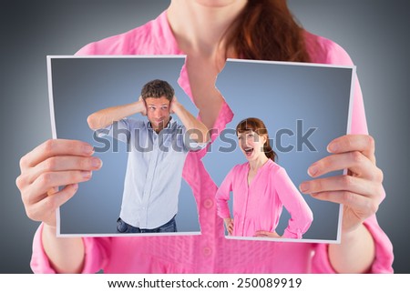 Woman arguing with ignoring man against grey vignette