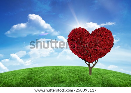 Love heart plant against green hill under blue sky