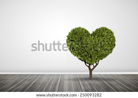 Heart shaped plant against grey room