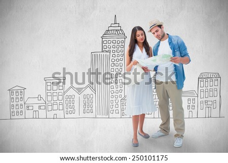 Lost hipster couple looking at map against white background