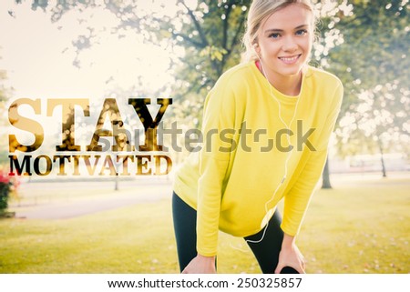Active cheerful blonde pausing after a run against stay motivated