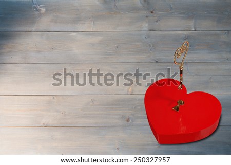 Love heart lock against bleached wooden planks background