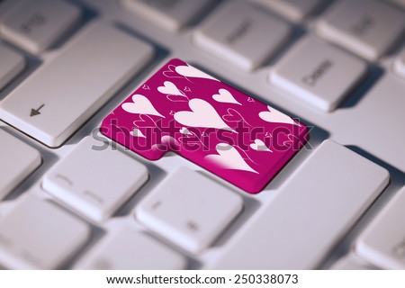 Valentines day pattern against pink enter key on keyboard