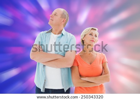 Thinking older couple with arms crossed against valentines heart pattern