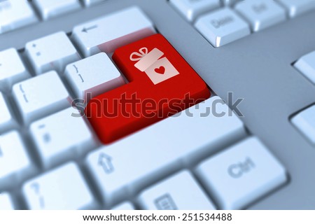 gift with heart against red enter key on keyboard