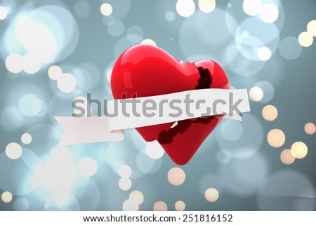 Heart with scroll against white glowing dots on blue