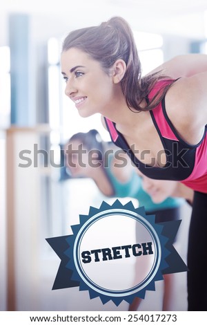 The word stretch and people doing power fitness exercise at yoga class against badge